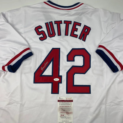 Autographed white baseball jersey with SUTTER 42 for authentic professional sports collectibles