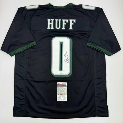Autographed black HUFF jersey from professional sports league, perfect sports collectible