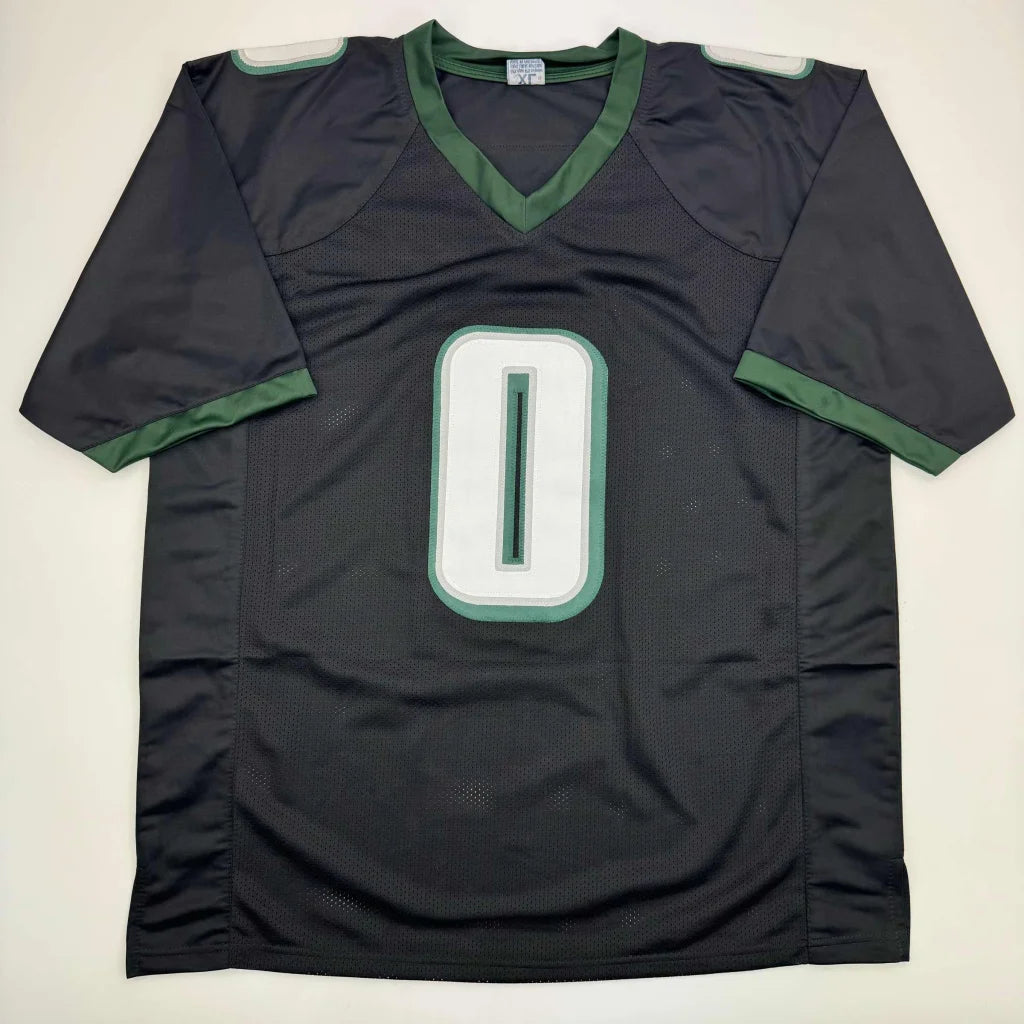 Black sports jersey with green trim and 0 number, perfect for professional sports fans