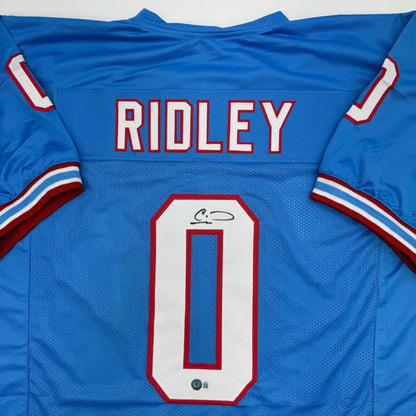 Autographed Calvin Ridley Tennessee Retro Blue Football Jersey Beckett BAS COA | Certified Authentic Signed Memorabilia | vintageantiquesgifts.com
