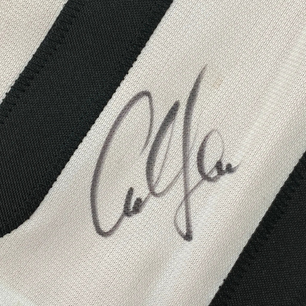 Autographed black and white striped custom jersey for professional sports and sports league fans