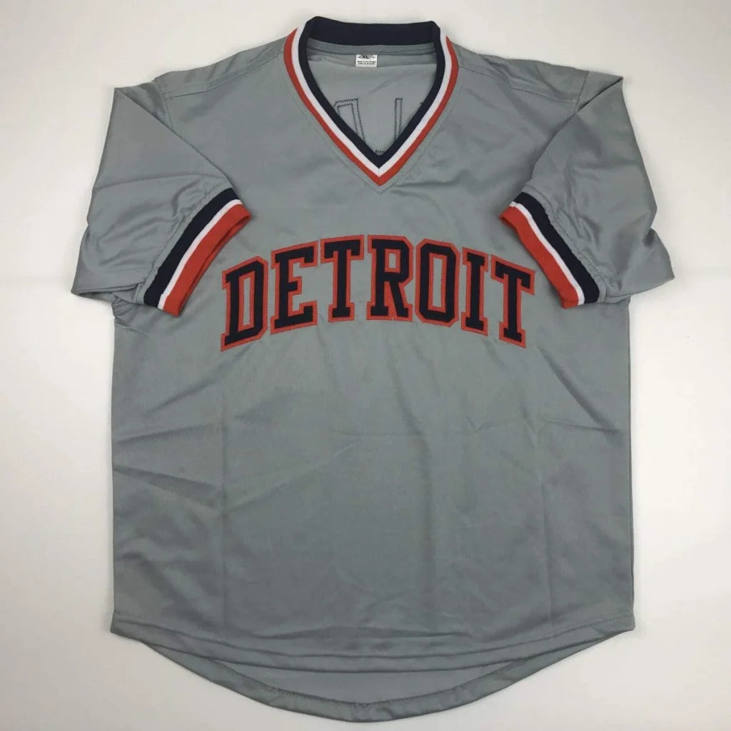 Gray short-sleeve baseball jersey with DETROIT in red and black, perfect for professional sports fans