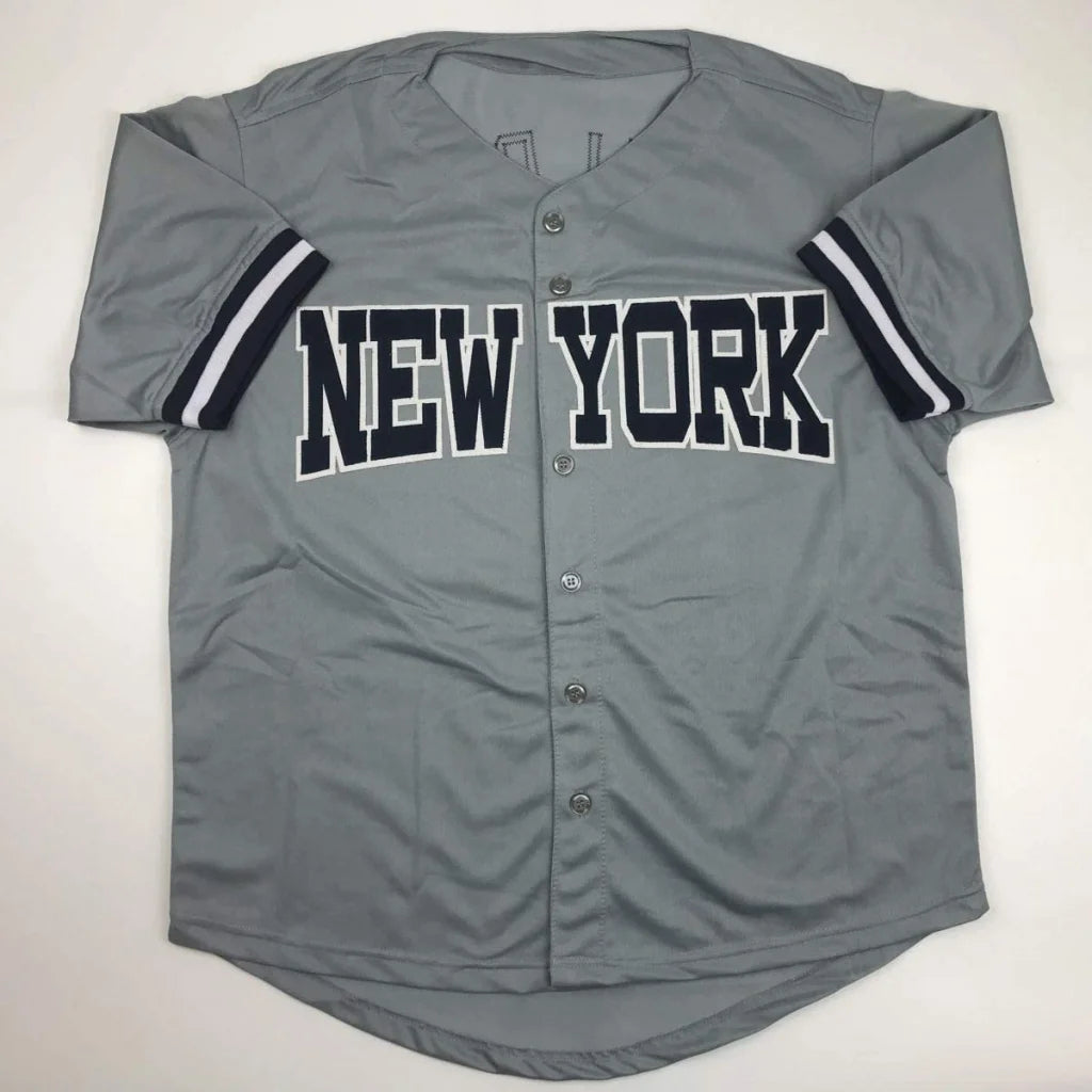 Gray short-sleeved baseball jersey with NEW YORK lettering, perfect for professional sports fans
