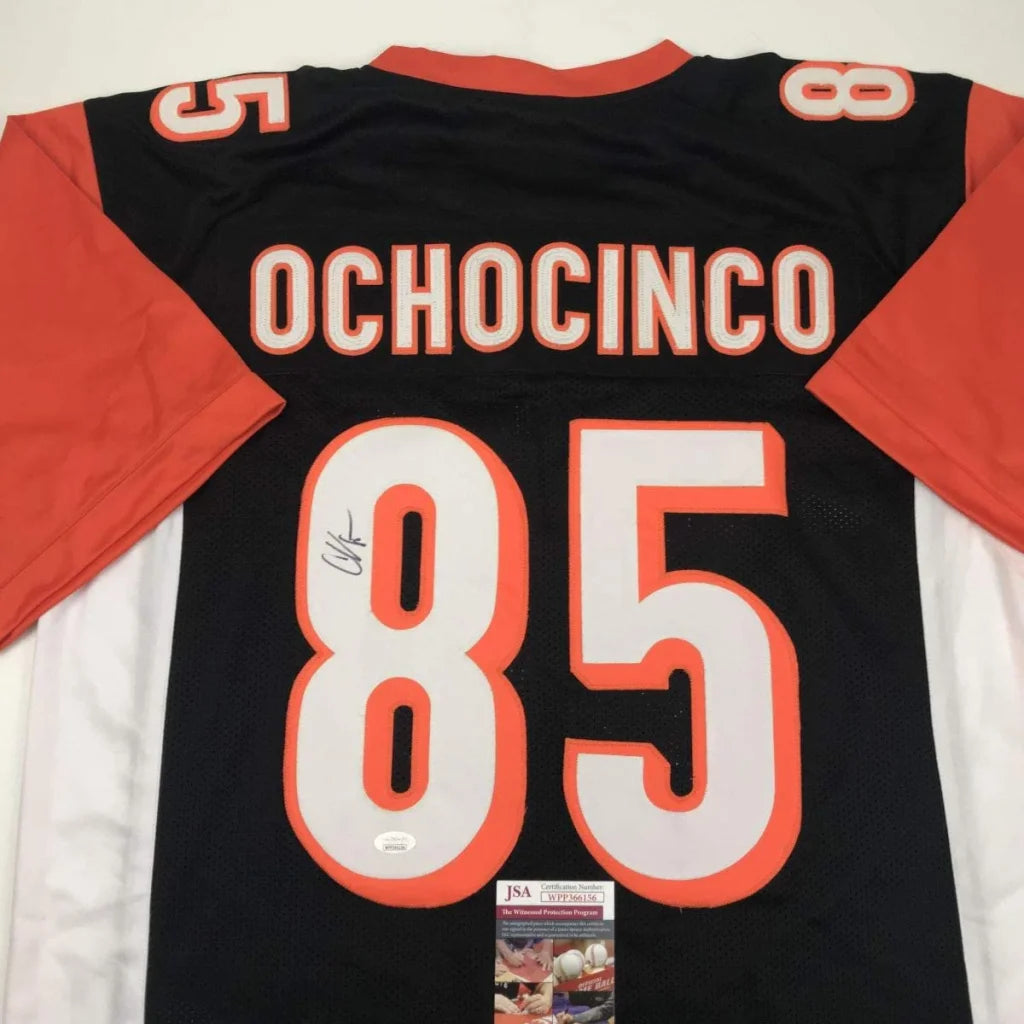 Signed Black and orange professional sports league custom jersey with Ochocinco 85 autograph