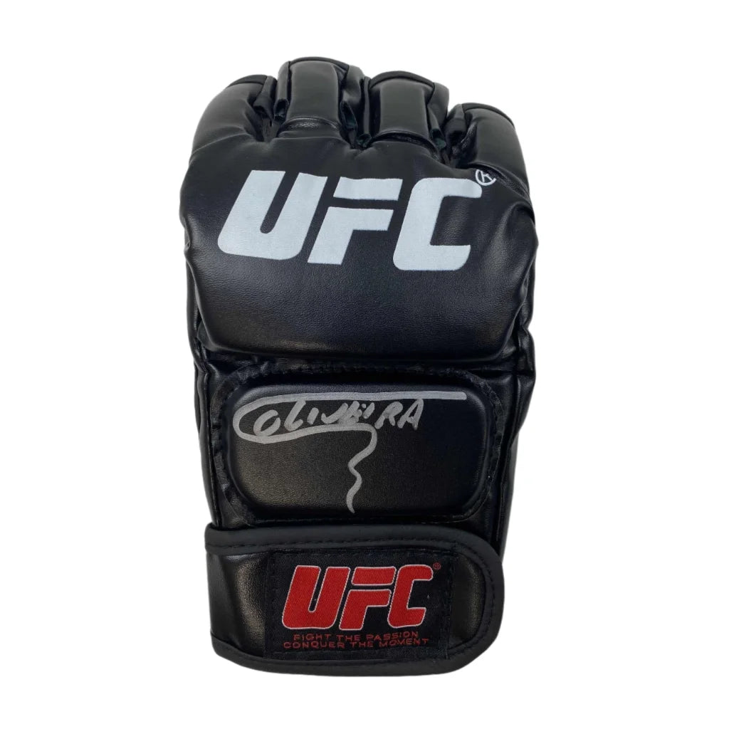 Black ufc mma glove with white and red branding featuring charles oliveira autographed wrist strap back view