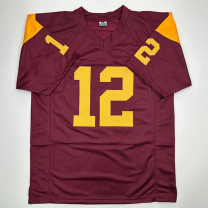 Autographed Charles White USC maroon custom jersey with gold 12, JSA COA