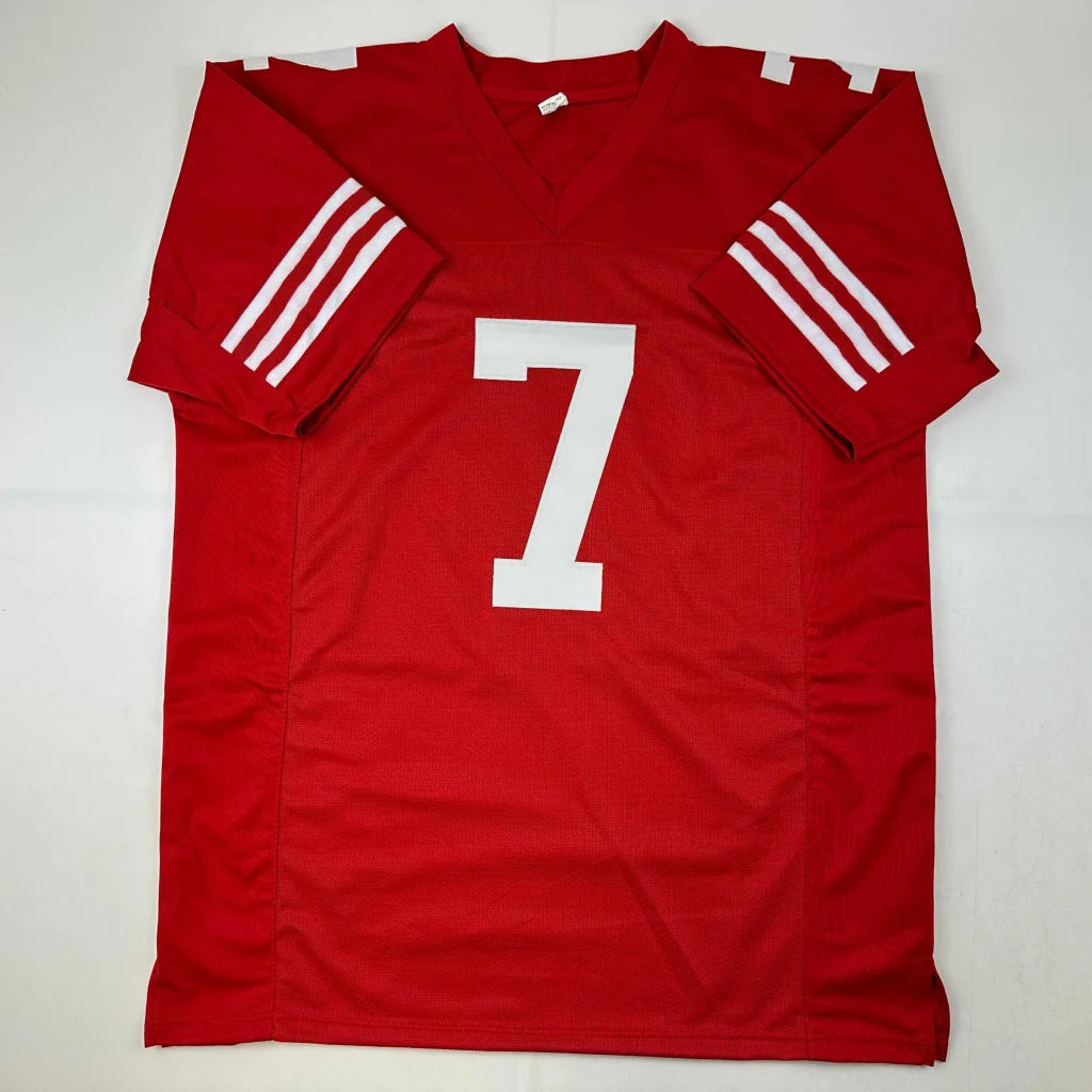 Autographed red charvarius ward football custom jersey with white number 7 and three white sleeve stripes for professional sports league