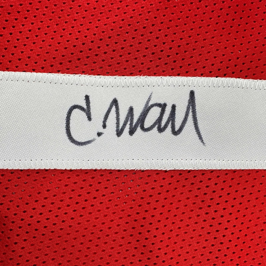 Red mesh athletic jersey with black cursive signature and white label featuring autographed charvarius ward logo professional sports use