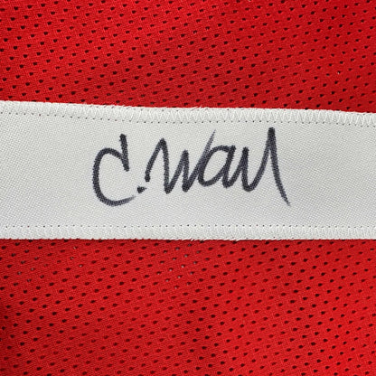 Red mesh athletic jersey with black cursive signature and white label featuring autographed charvarius ward logo professional sports use