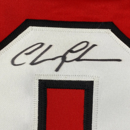 Autographed Chevy Chase Clark Griswold Christmas Vacation Movie Chicago Red Hockey Jersey Beckett BAS COA | Authenticated Signed Sports Jersey | vintageantiquesgifts.com
