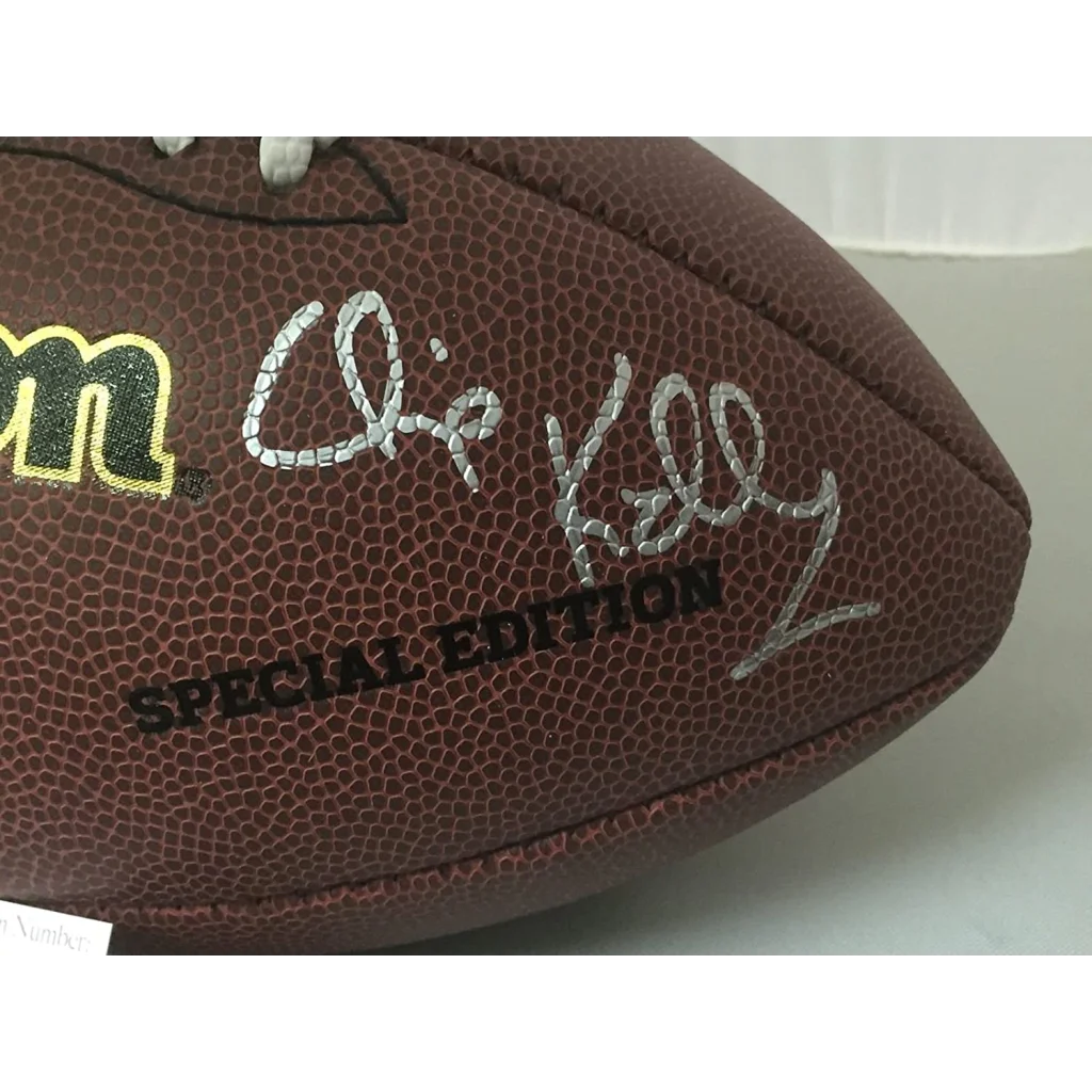 Brown leather NFL football with two silver autographs and JSA proof for authenticity