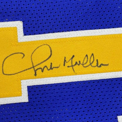 Autographed blue and yellow Chris Mullin Golden State Warriors professional sports jersey