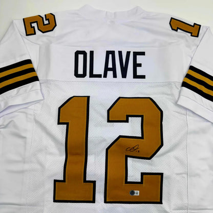 Autographed Chris Olave New Orleans White Color Rush Football Jersey Beckett BAS COA | Certified Authentic Signed Memorabilia | vintageantiquesgifts.com