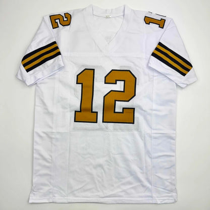 Autographed Chris Olave New Orleans White Color Rush Football Jersey Beckett BAS COA | Authenticated Signed Sports Jersey | vintageantiquesgifts.com
