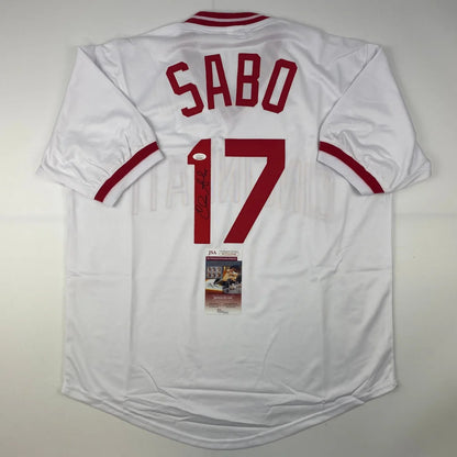 White custom jersey with red trim and number for professional sports collectibles