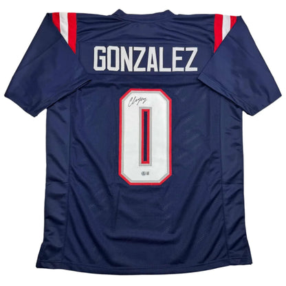Back of autographed Christian Gonzalez navy custom jersey, New England pro sports league, Gonzalez 0