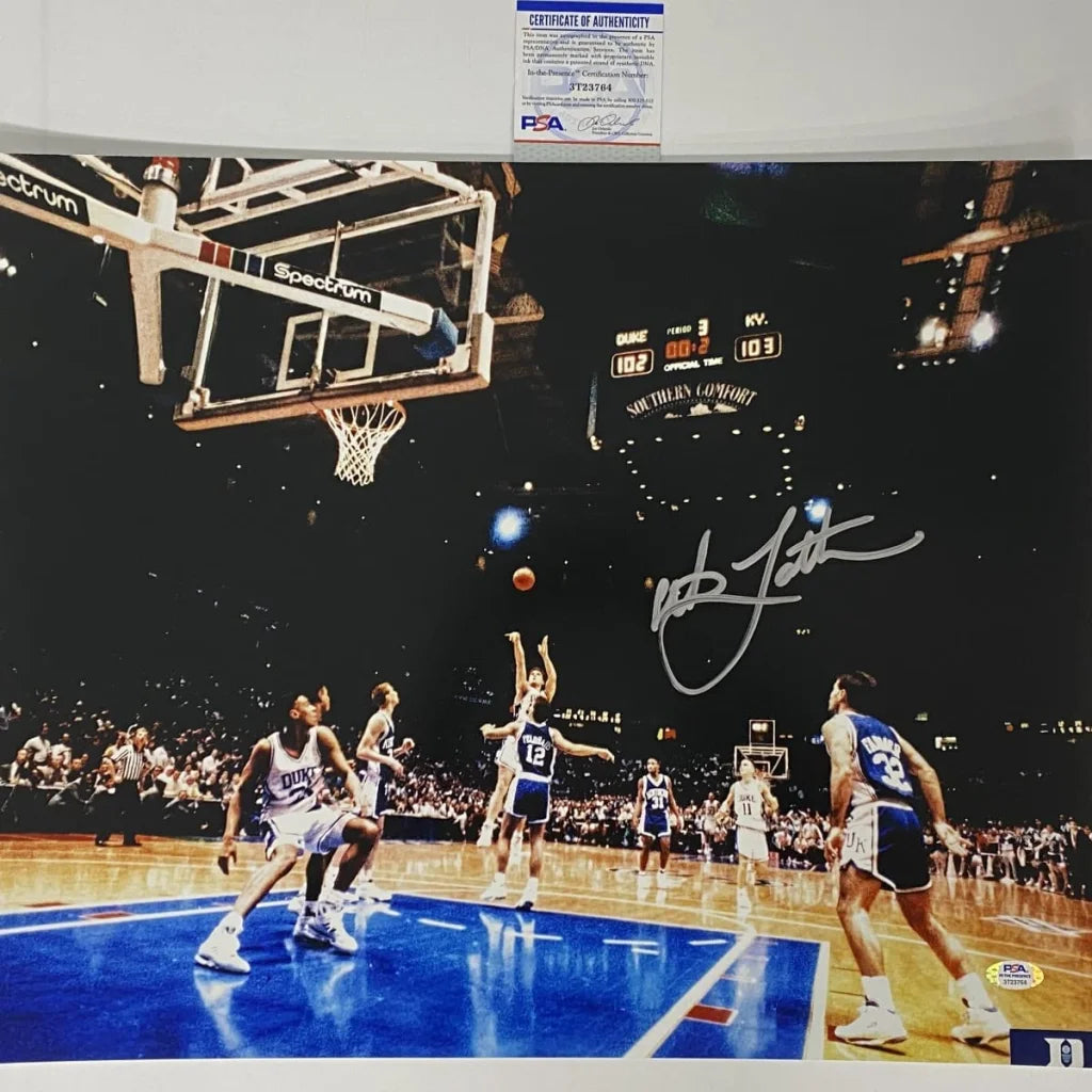 Autographed basketball action photo with Certificate of Authenticity from Rock Solid Guarantee