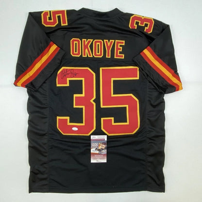 Autographed Christian Okoye Kansas City Chiefs NFL jersey for professional sports fans