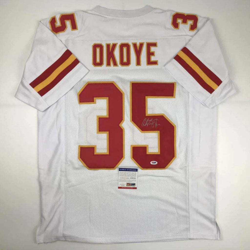 Autographed Christian Okoye custom jersey, white with red gold lettering, number 35