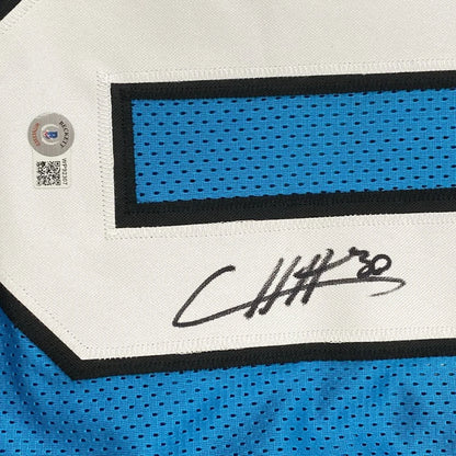 Autographed blue Chuba Hubbard custom jersey from professional sports league with Beckett sticker