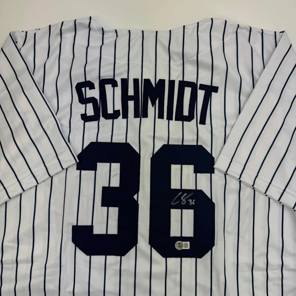 Autographed Clarke Schmidt New York Pinstripe Baseball Jersey Beckett BAS COA | Certified Authentic Signed Memorabilia | vintageantiquesgifts.com