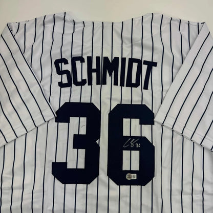 Autographed Clarke Schmidt New York Pinstripe Baseball Jersey Beckett BAS COA | Certified Authentic Signed Memorabilia | vintageantiquesgifts.com