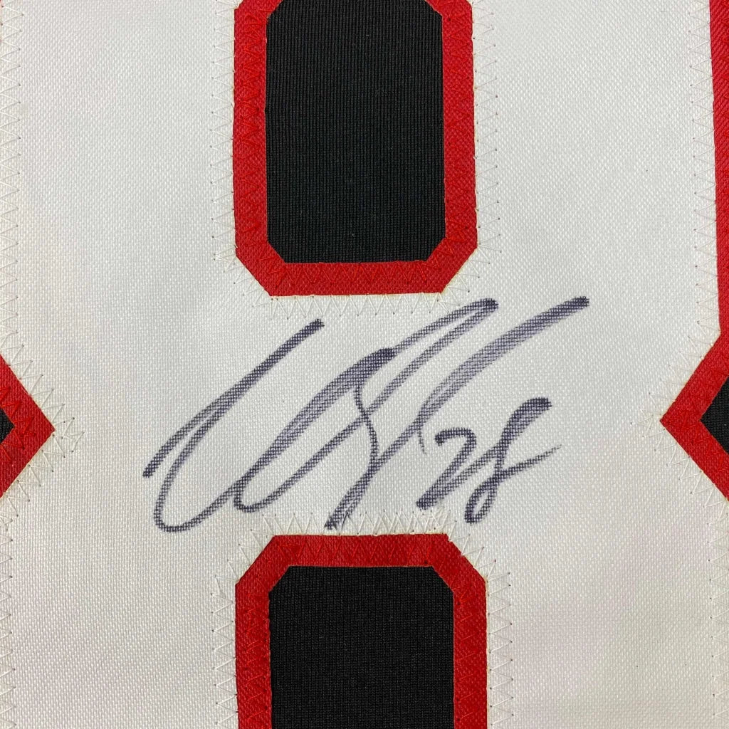 Autographed white custom jersey with red and black accents from Professional Sports League