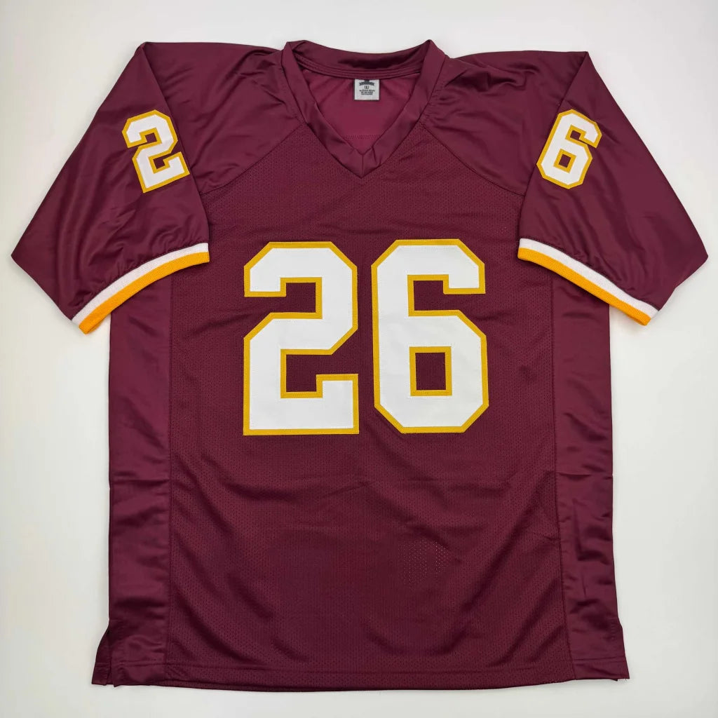 Maroon custom jersey with white and gold trim and number 26 for professional sports league