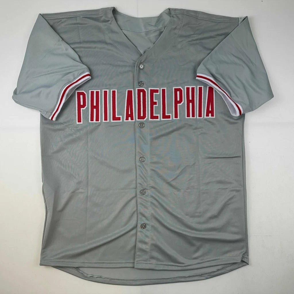Gray short-sleeve baseball jersey with Philadelphia and red stripes for professional sports fans