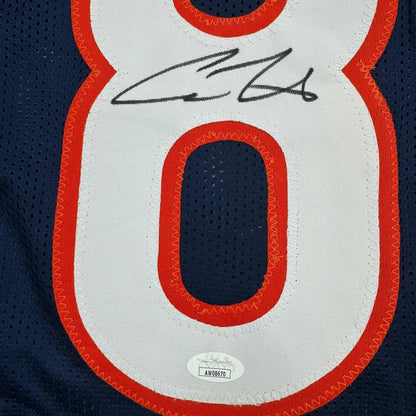 Autographed cole kmet chicago blue custom football jersey with orange trim and bold number 8 in professional sports league style