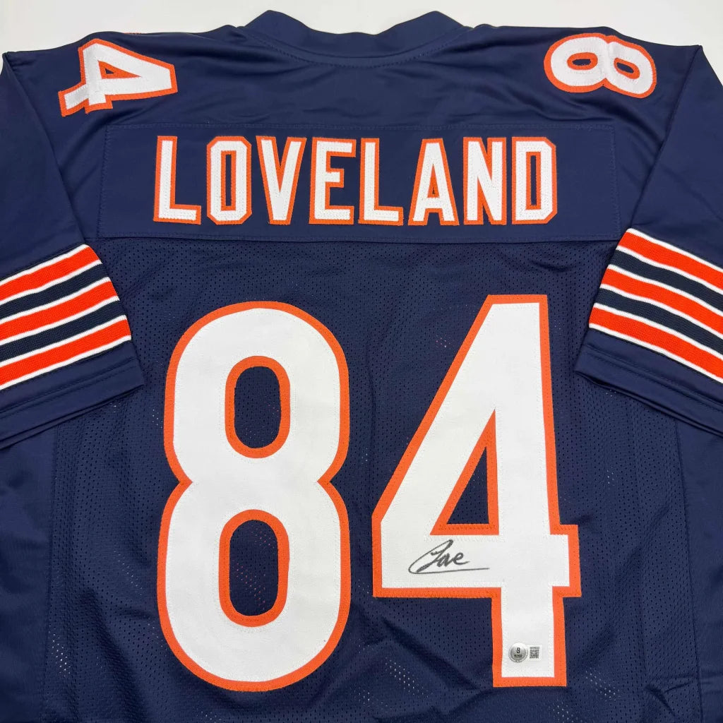 Back of autographed Colston Loveland Chicago Bears custom jersey, navy blue orange number 84
