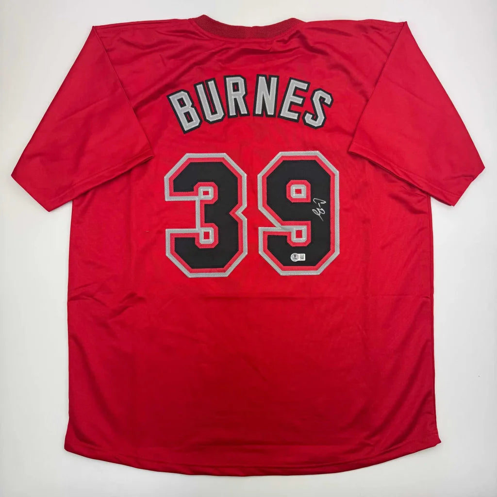 Red baseball jersey with ’BURNES’ and ’39’’ on the back.