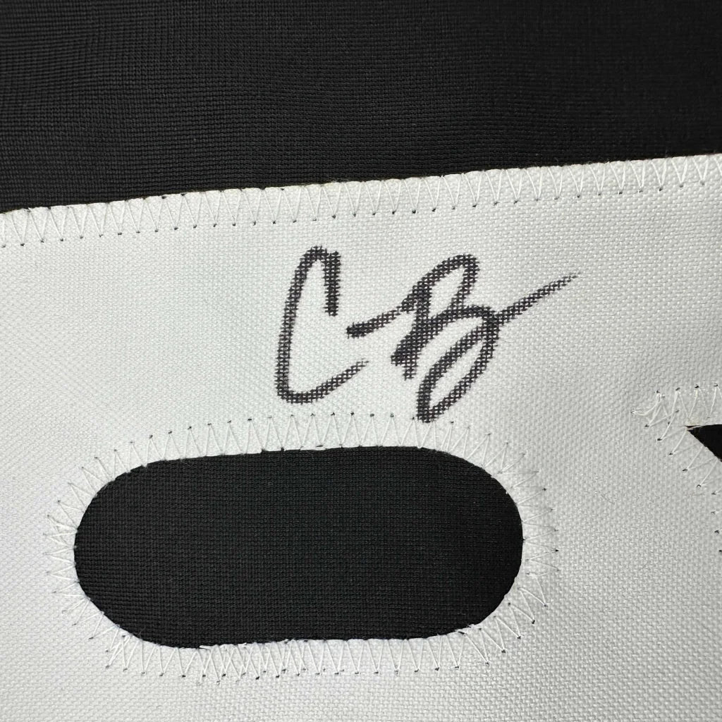 White fabric face mask with black stitching and autograph from the Unique Custom Jersey Collection beyond Professional Sports League Gear