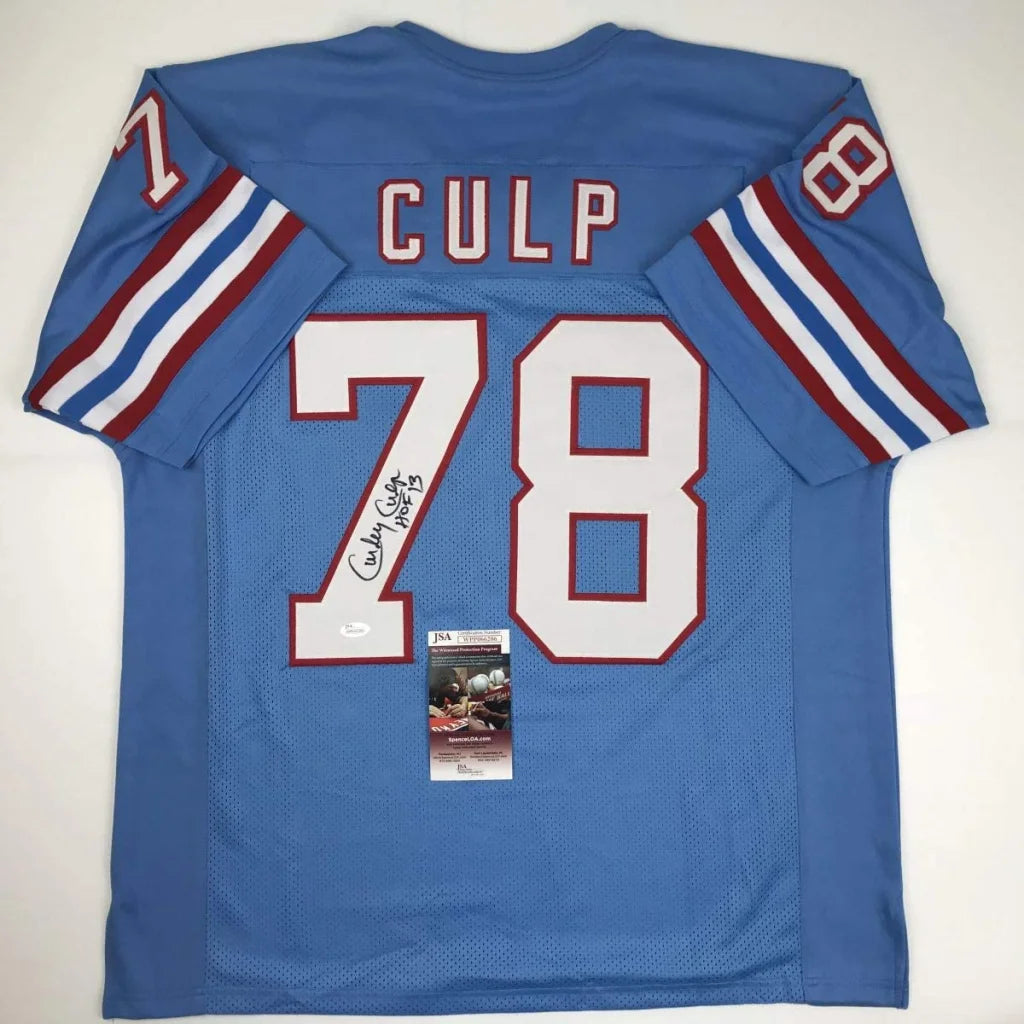 Back of blue mesh custom jersey with white and red 78 numerals and name culp from professional sports league football