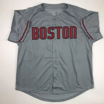 Gray Boston baseball jersey with red lettering and trim from Authentic Schilling 38 custom jersey in professional sports league