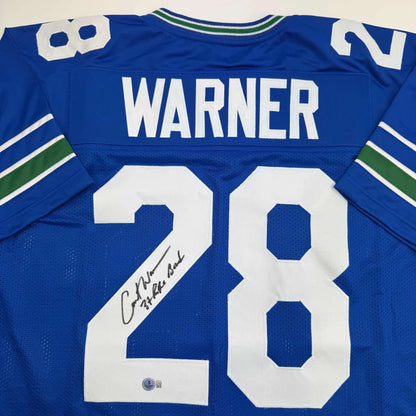 Autographed Curt Warner 3x Pro Bowl Seattle Blue Retro Football Jersey Beckett BAS COA | Certified Authentic Signed Memorabilia | vintageantiquesgifts.com