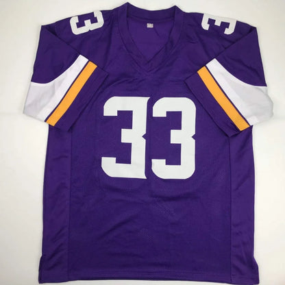 Autographed dalvin cook minnesota vikings purple custom jersey with white gold stripes and number 33 for professional sports league