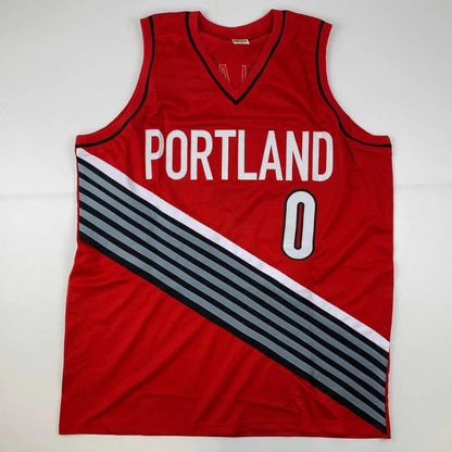 Damian Lillard Portland red jersey with third party authentication and autograph front view