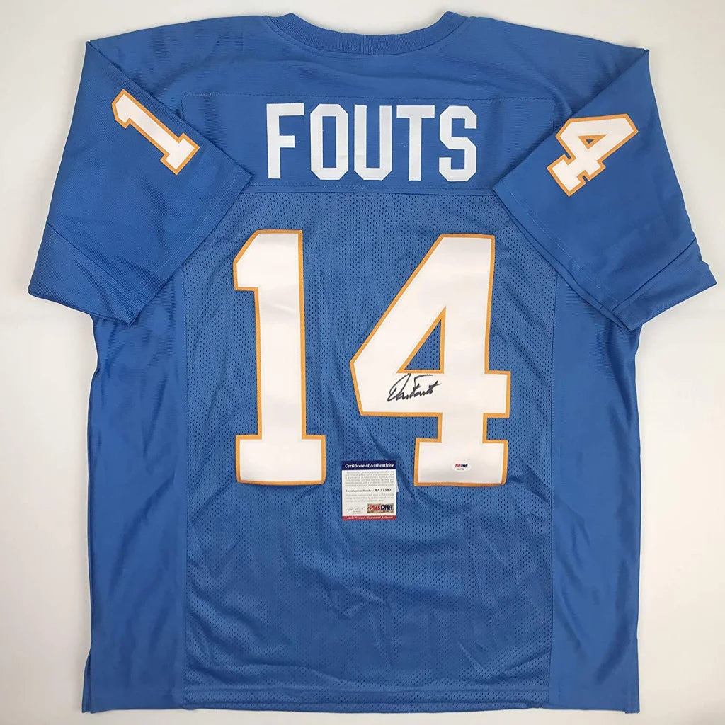 Back of a blue custom jersey with white and gold lettering featuring fouts 14 from a professional sports league