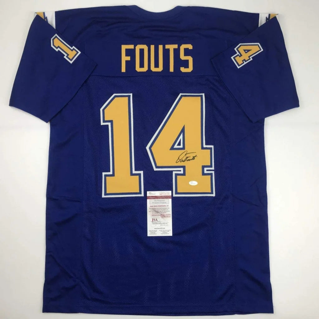 Back of autographed dan fouts san diego royal blue custom football jersey with gold lettering from professional sports league