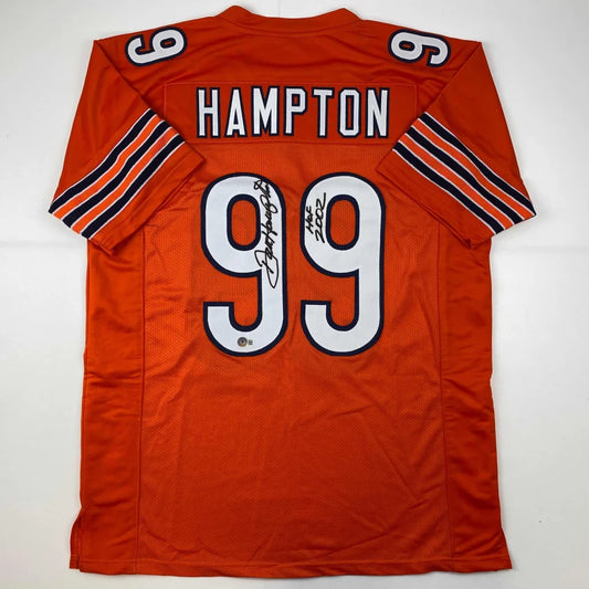 Back of orange chicago football jersey with white black lettering hampton 99 autographed custom jersey professional sports league