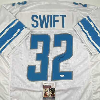 White and blue autographed dandre swift detroit lions custom jersey with bold number 32 and signature, certified by jsa coa