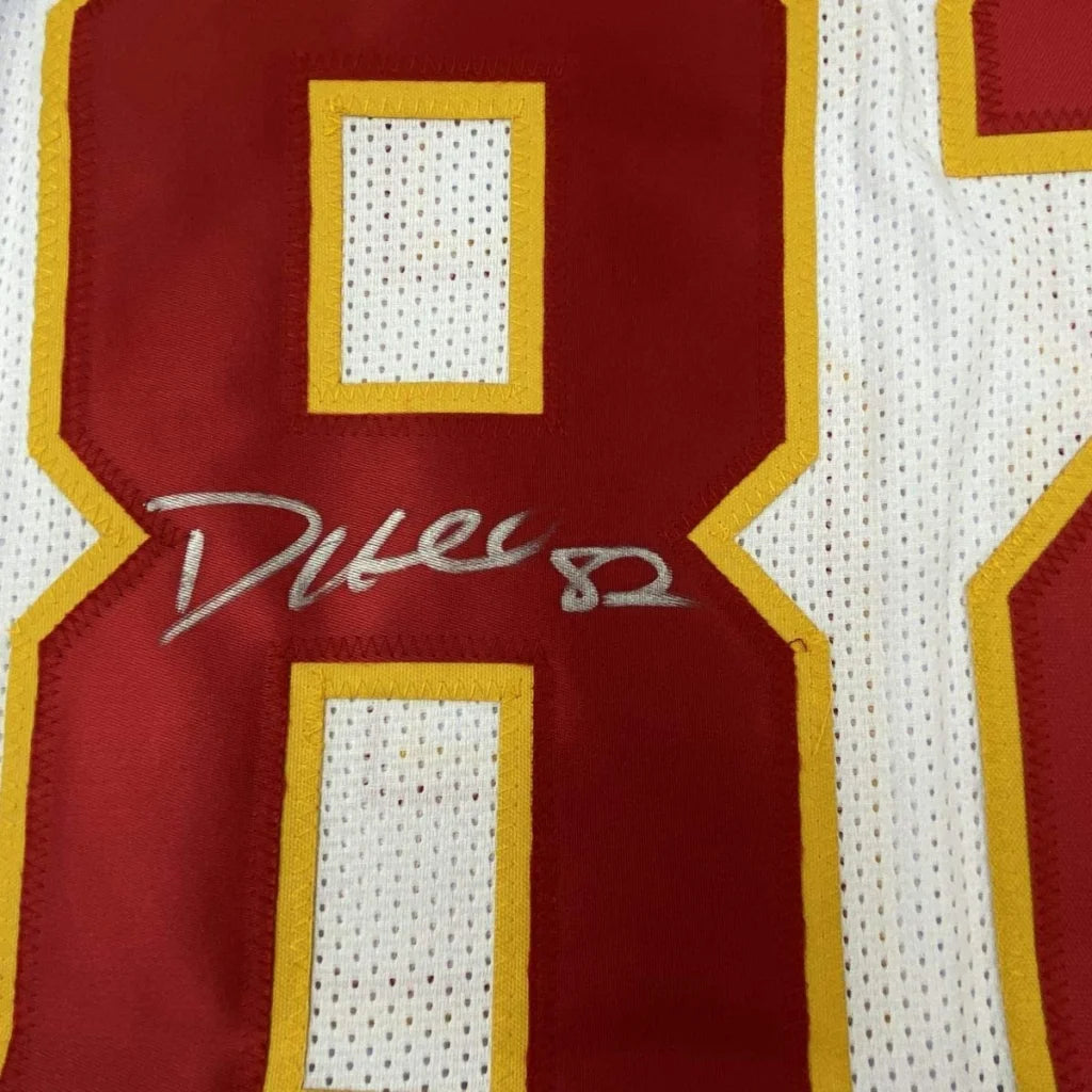 Red and white custom jersey signed by Diker 82 from professional sports league