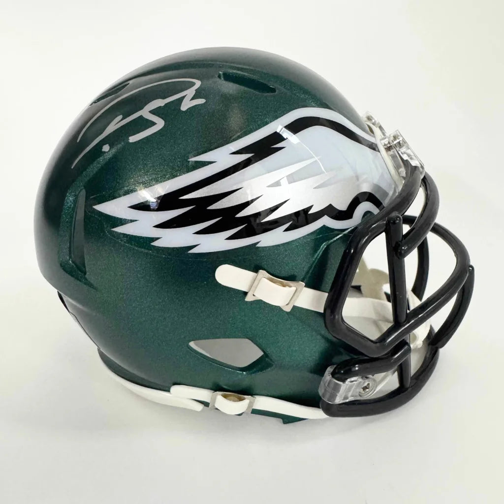 Autographed Philadelphia Eagles Mini Helmet in display case for fans and collectors