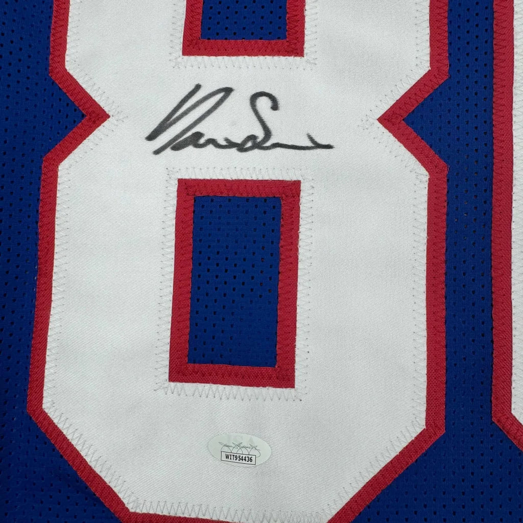 Blue and white custom jersey with red trim and black autograph from Slayton Professional Sports League