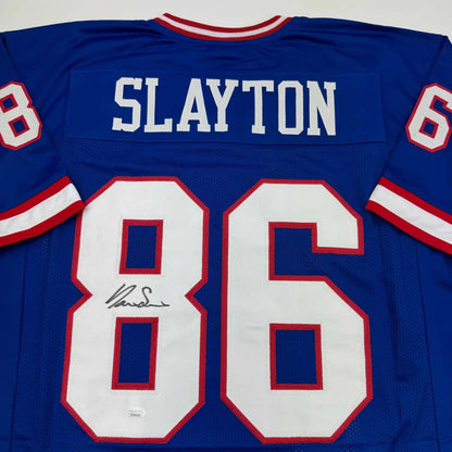 Blue custom jersey with white and red numbers and autograph from a professional sports league