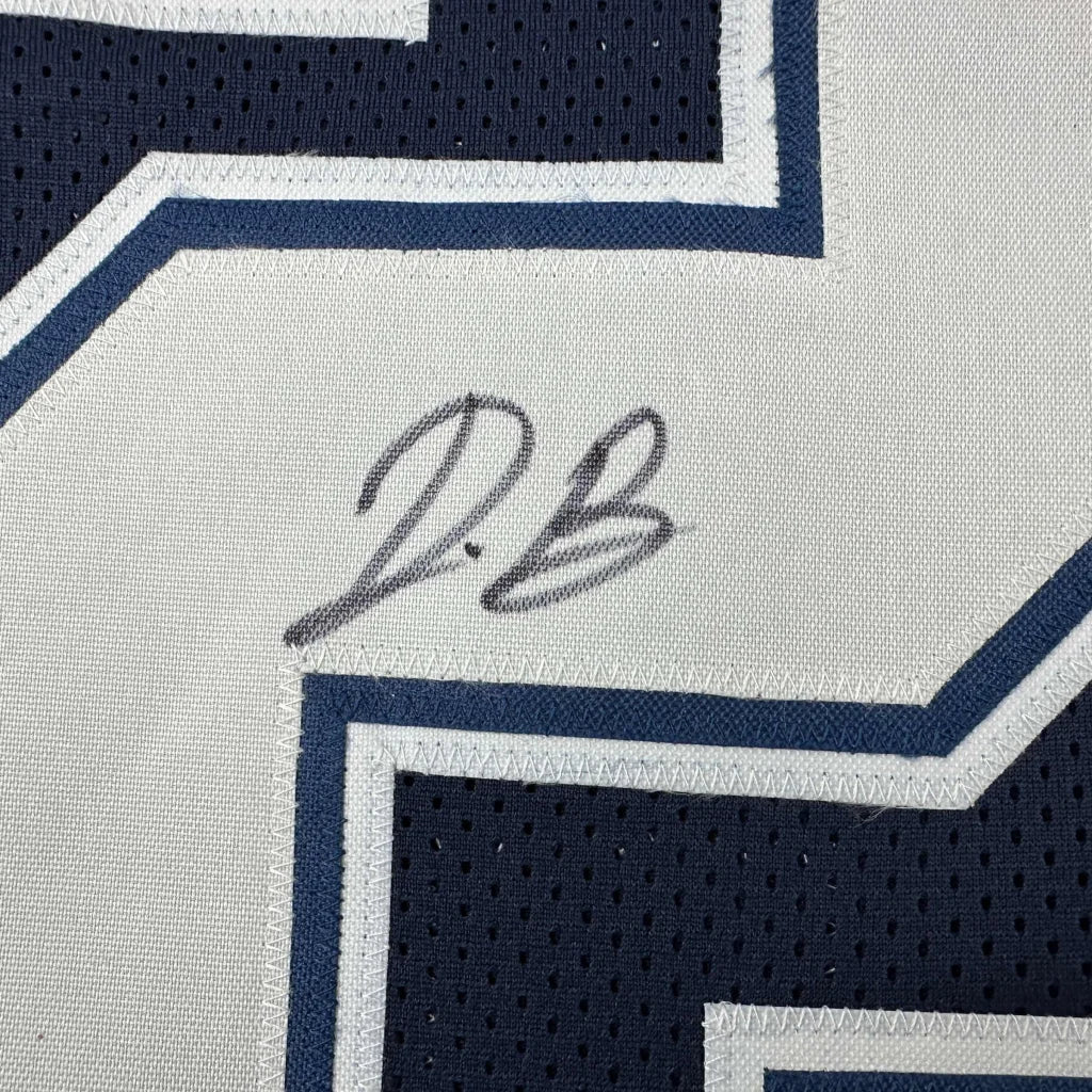 Autographed blue and white custom jersey from Daron Bland for professional sports fans