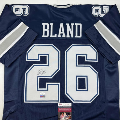 Signed Daron Bland #26 Dallas Cowboys custom jersey, a pro sports league collectible