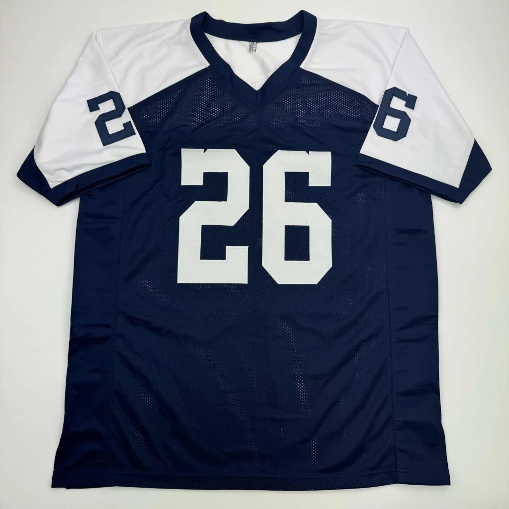 Navy blue and white short-sleeved football jersey with number 26 from professional sports league