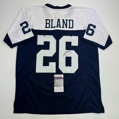 Signed football jersey with number 26 from the Professional Sports League collection